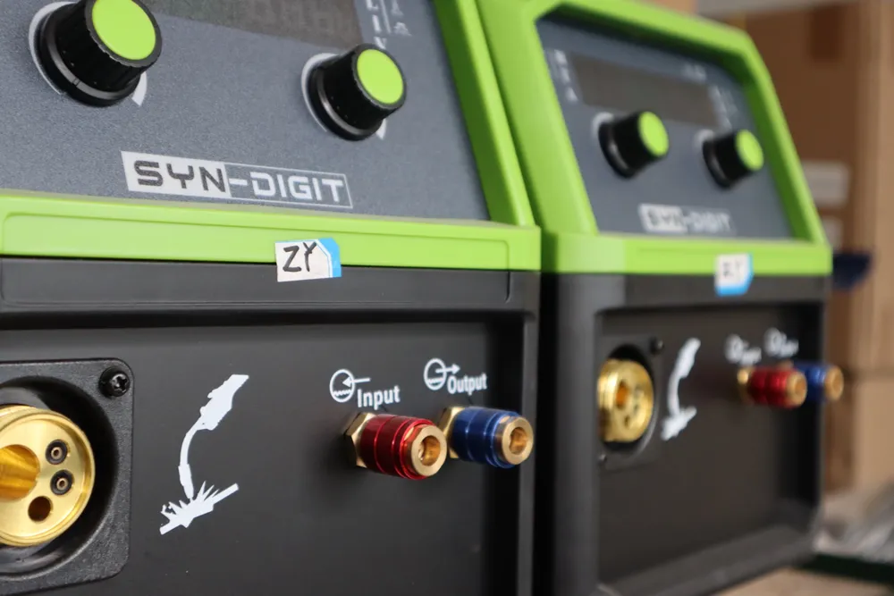 Close-up of a digital MIG welding machine panel for parameter control and repeatable settings.