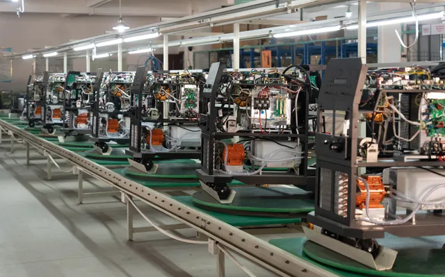 Deyun welding machines moving through the assembly line